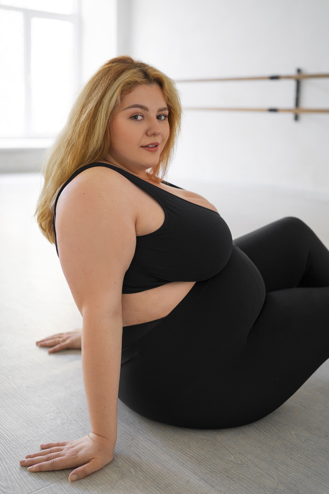 side view professional plus size dancer training